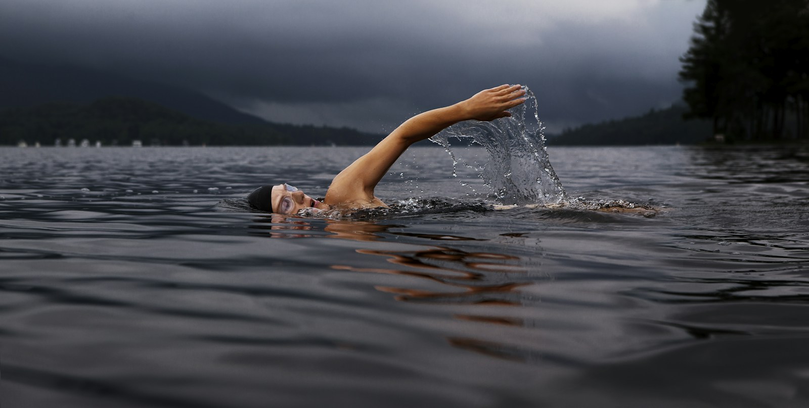 Open-water swimming near Lisbon: beginner safety, colder courage, and finding calm group swims